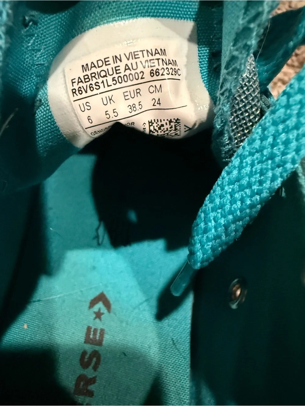 Kids Bright Teal Low-Top Converse with sparkle tongue